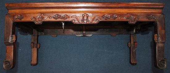 A Chinese huanghuali kang table, 18th/19th century, l. 29.5in., w. 17.25in., h. 12in., repairs